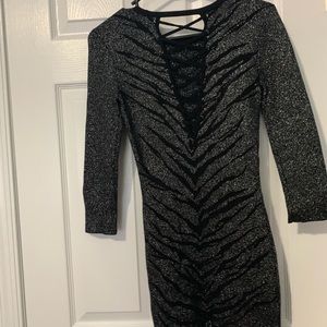 Tight black sparkly express dress